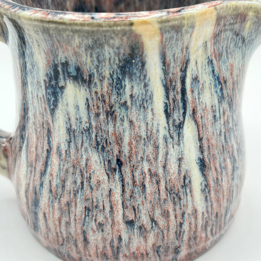 Running Leopard Creamer