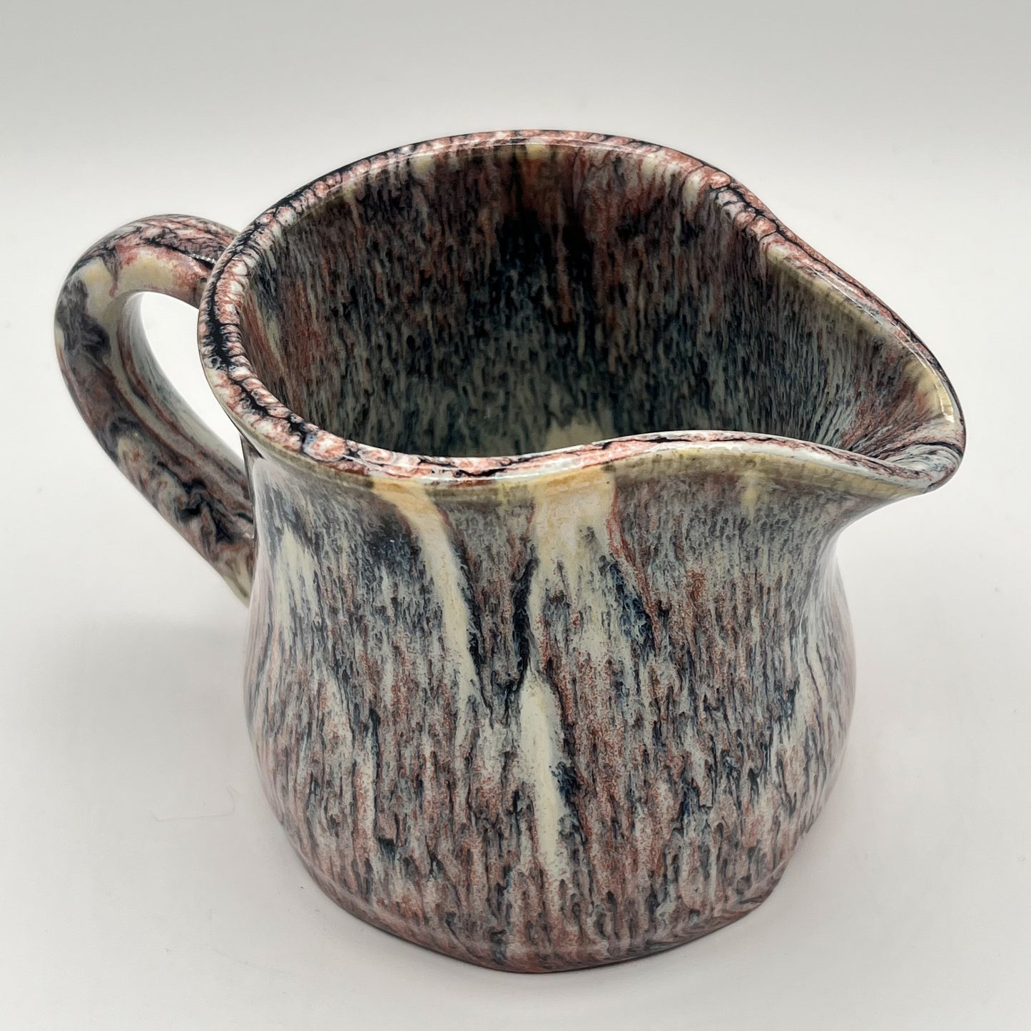 Running Leopard Creamer