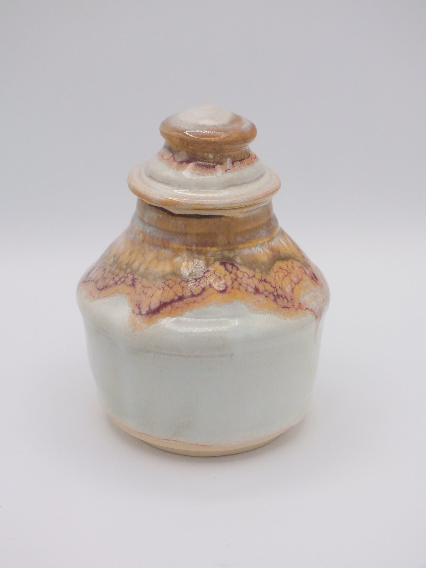 Small stoneware covered jar