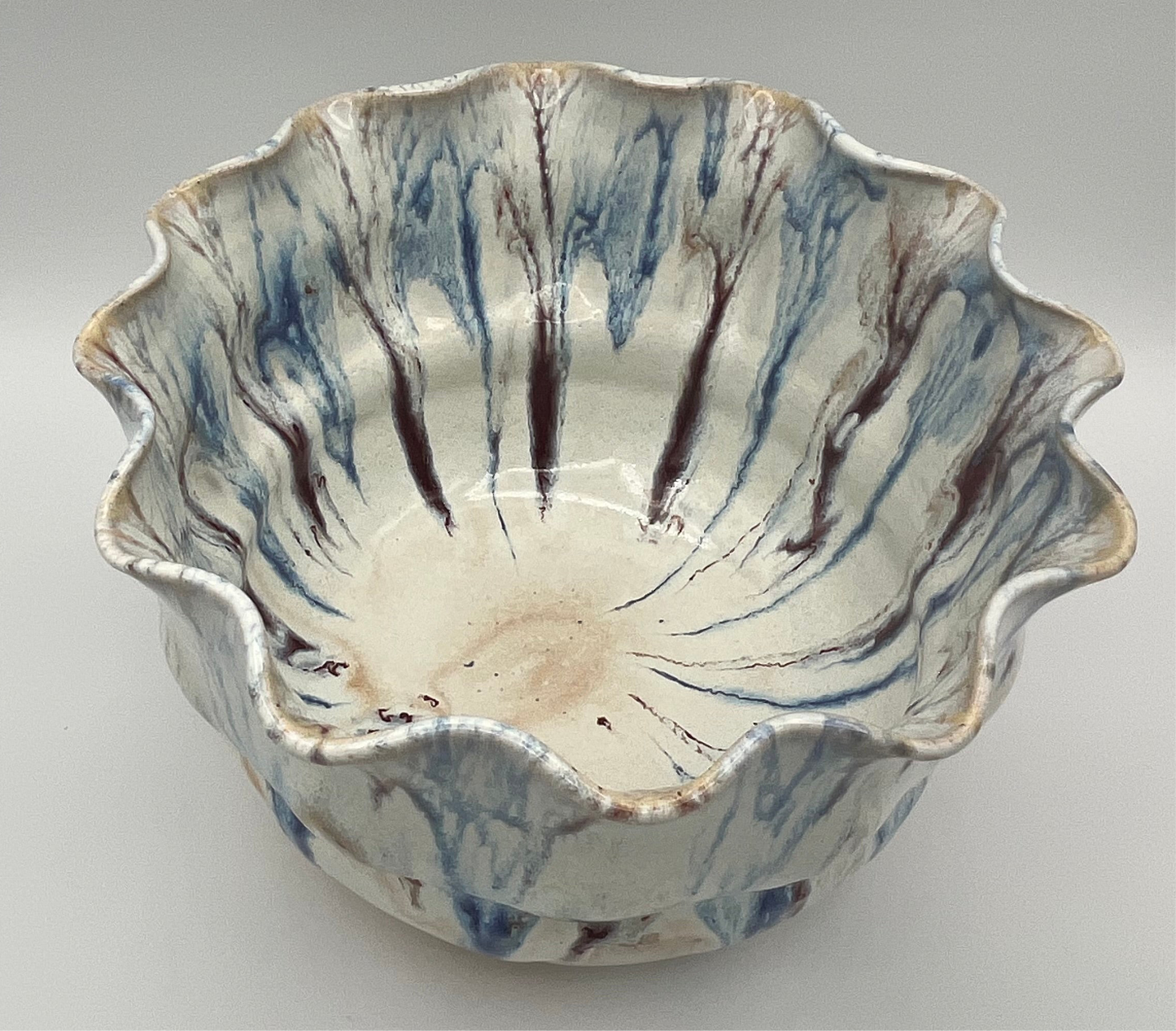 Wheel-thrown mixing bowl with fluted edge