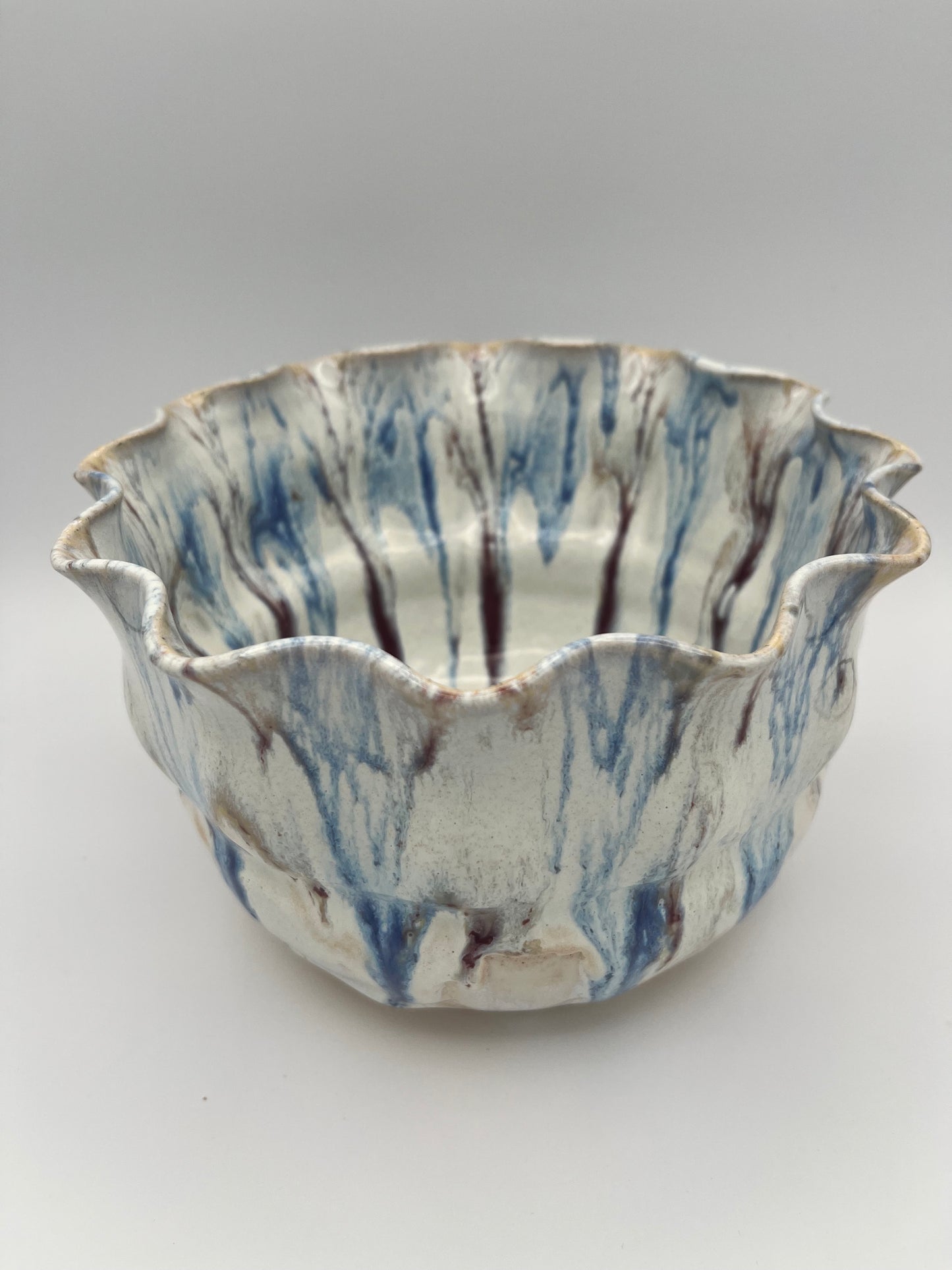 Wheel-thrown mixing bowl with fluted edge