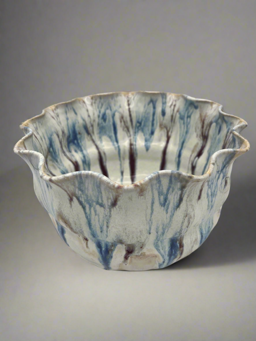 Wheel-thrown mixing bowl with fluted edge