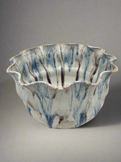 Wheel-thrown mixing bowl with fluted edge