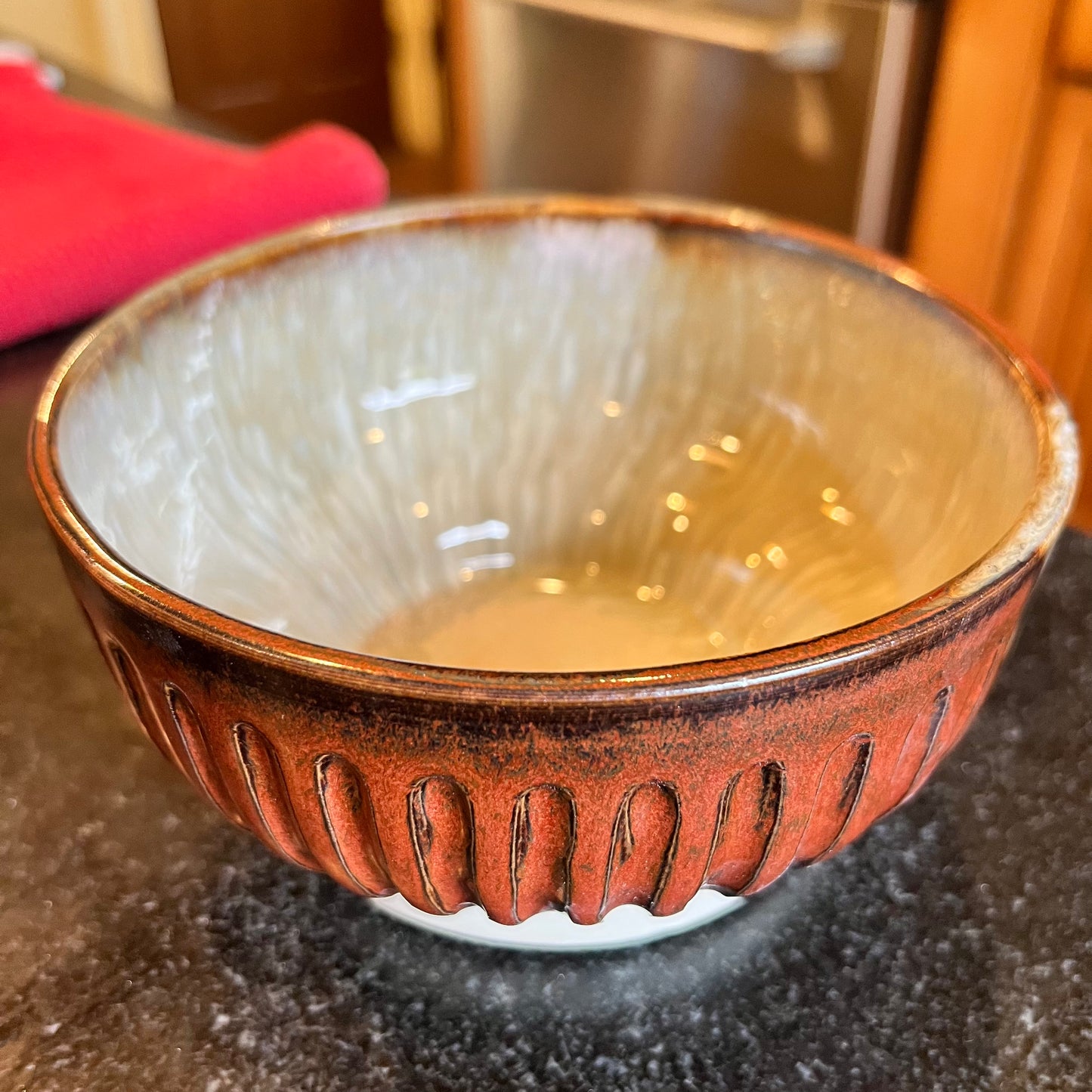 Carved Stoneware Bowl with Copper Red Glaze