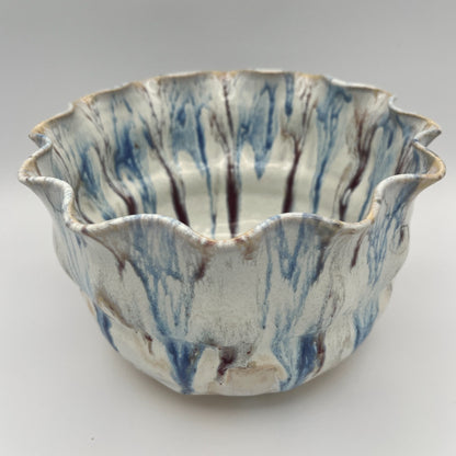 Wheel-thrown mixing bowl with fluted edge