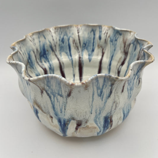 Wheel-thrown mixing bowl with fluted edge