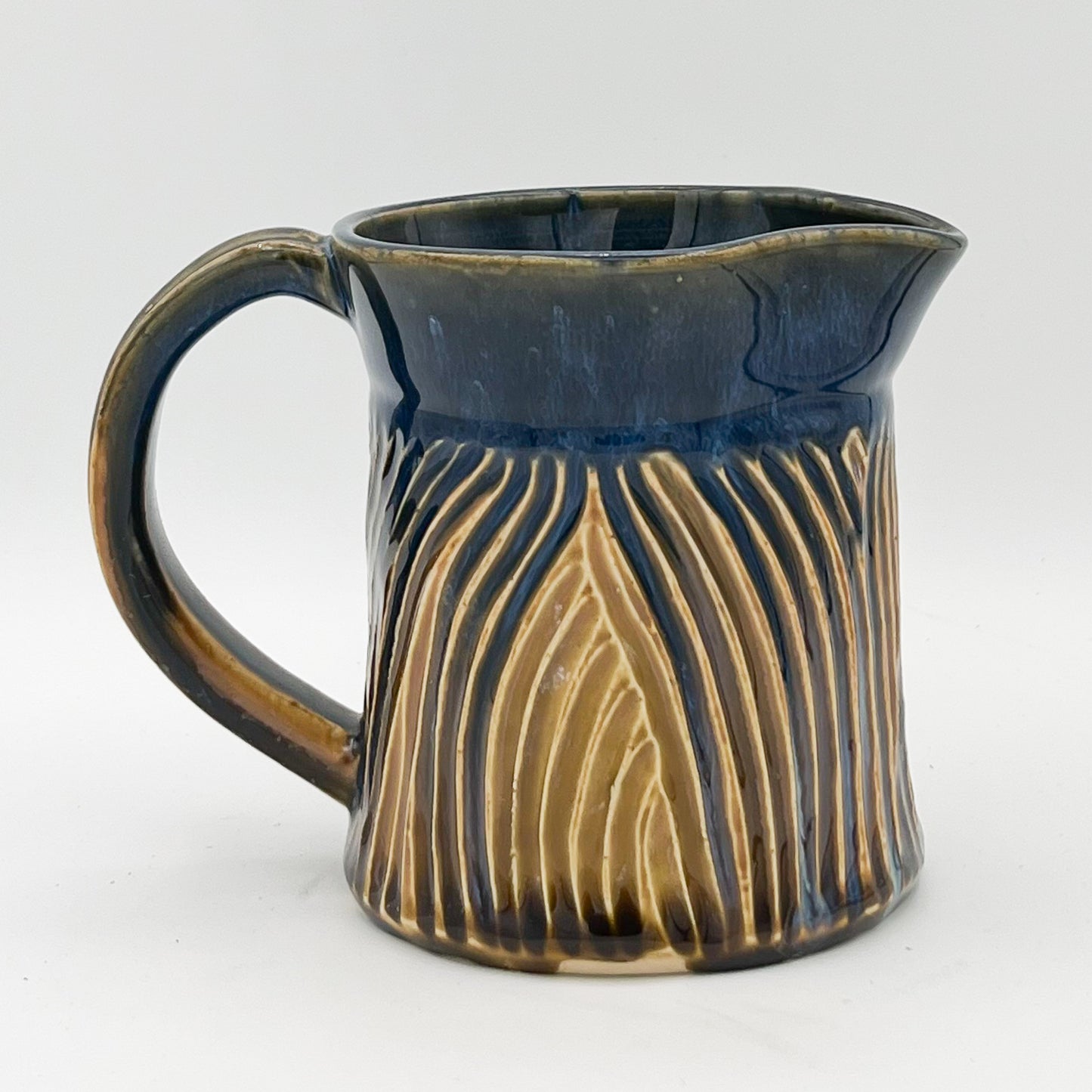 Gold and Blue Carved Pitcher