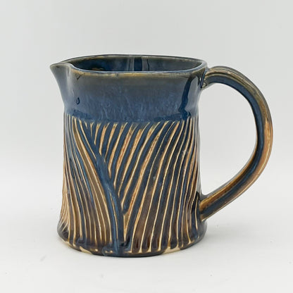 Gold and Blue Carved Pitcher