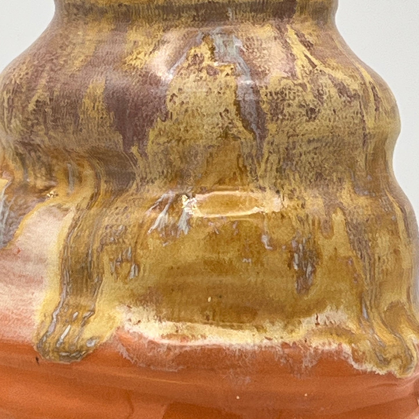 Close-up of a ceramic vase with a textured surface