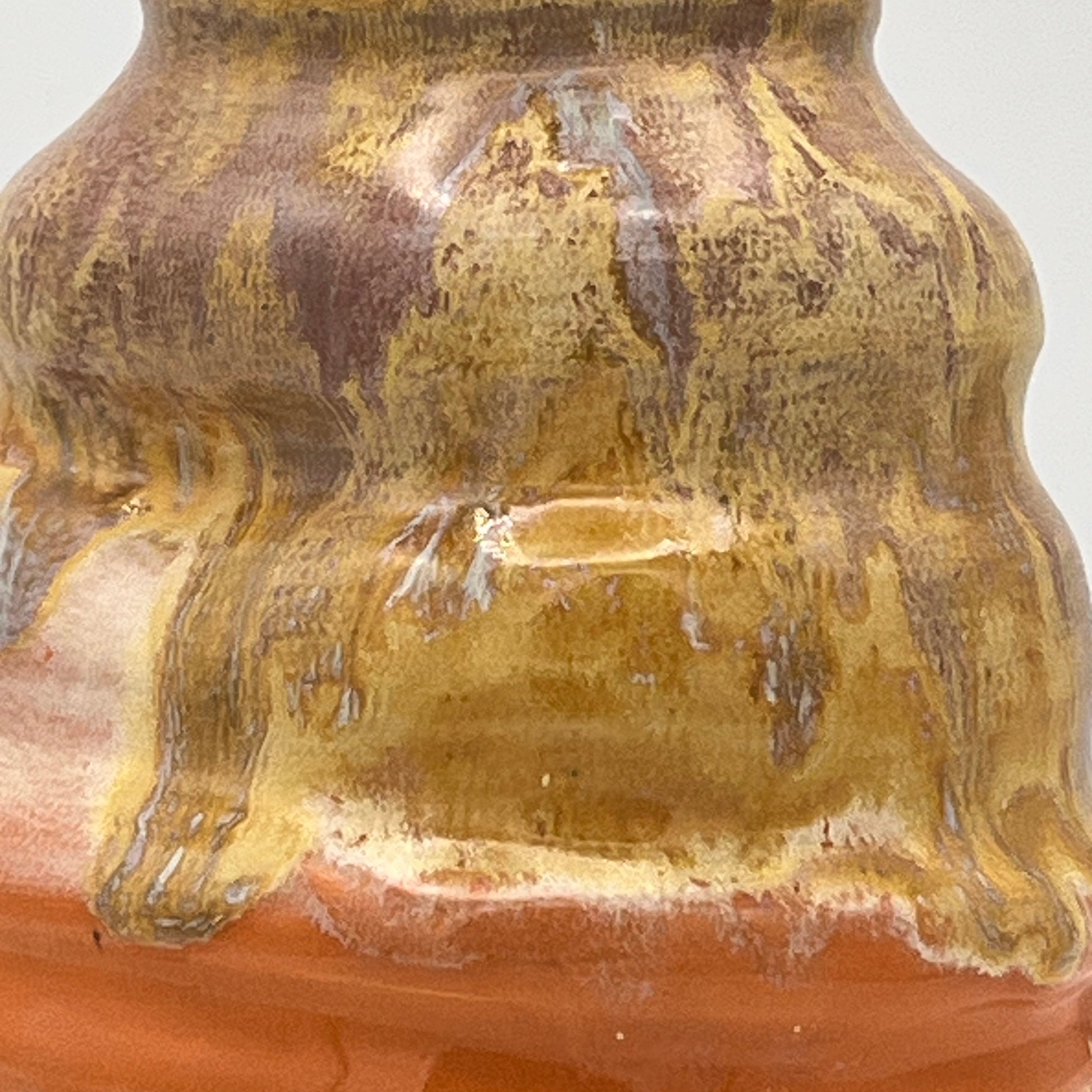 Close-up of a ceramic vase with a textured surface