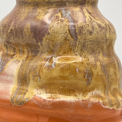 Close-up of a ceramic vase with a textured surface
