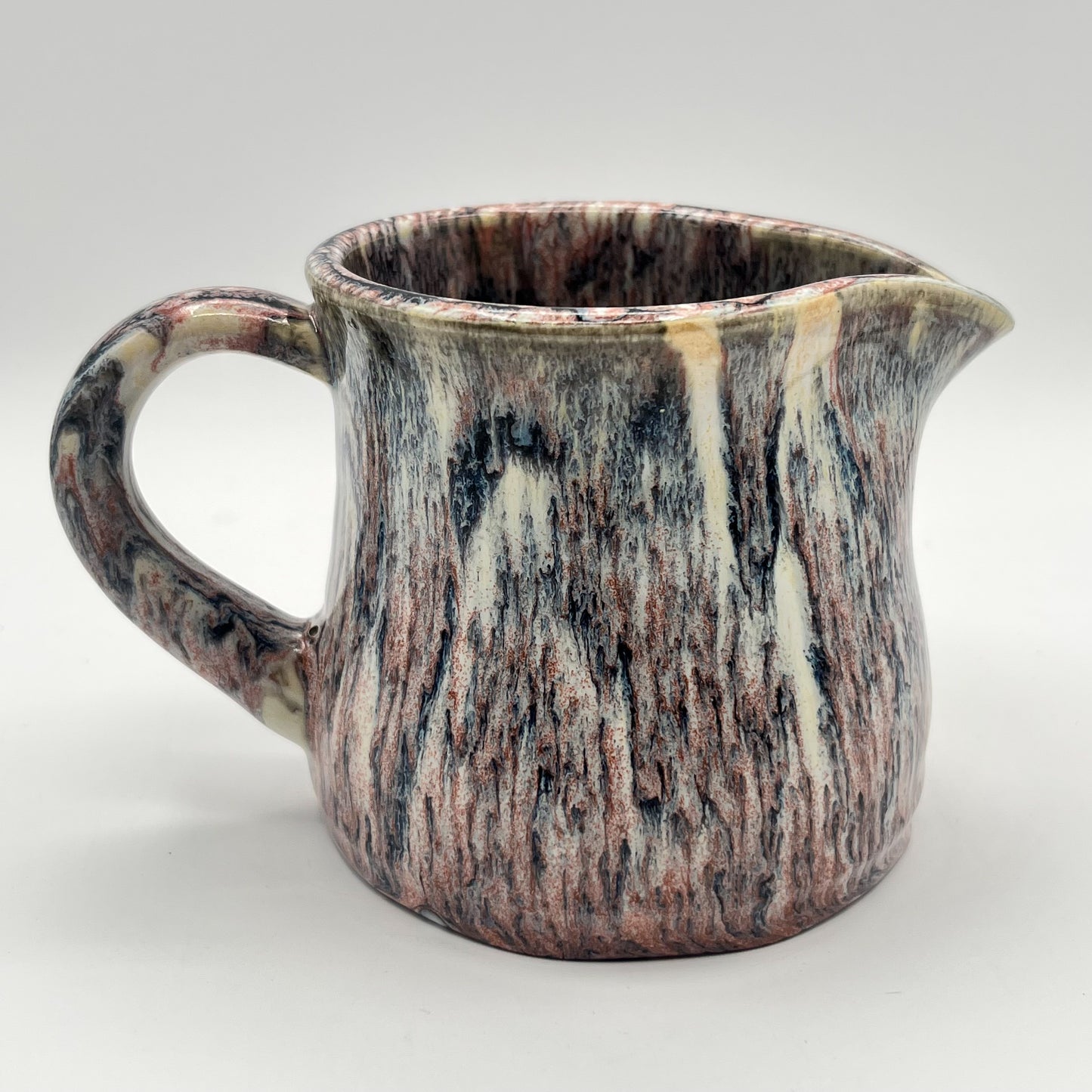 Running Leopard Creamer