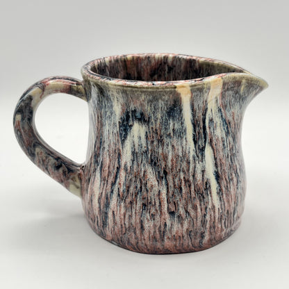 Running Leopard Creamer