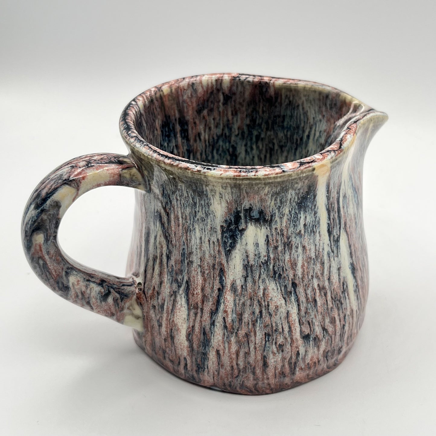 Running Leopard Creamer