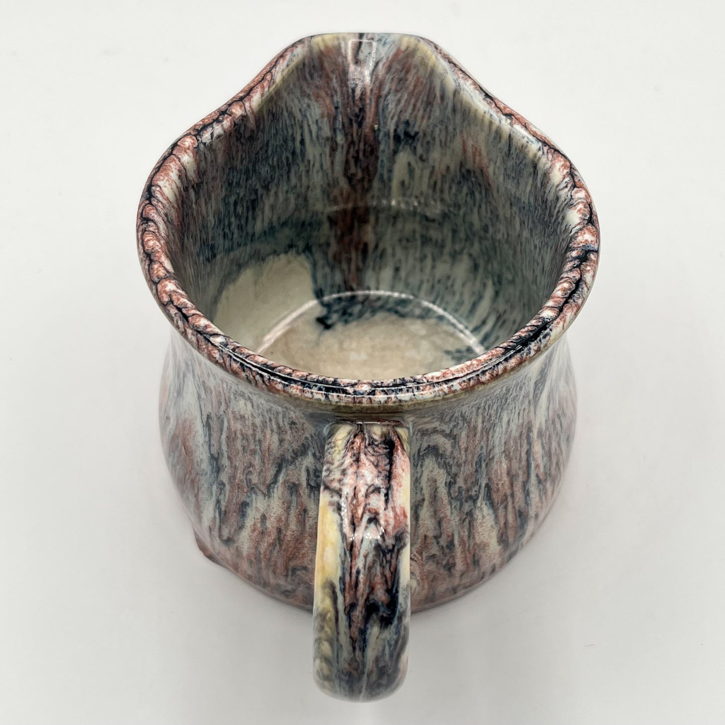 Running Leopard Creamer