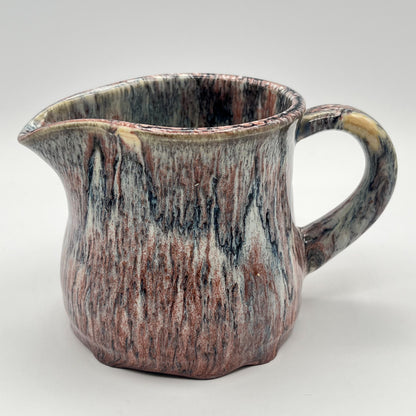 Running Leopard Creamer