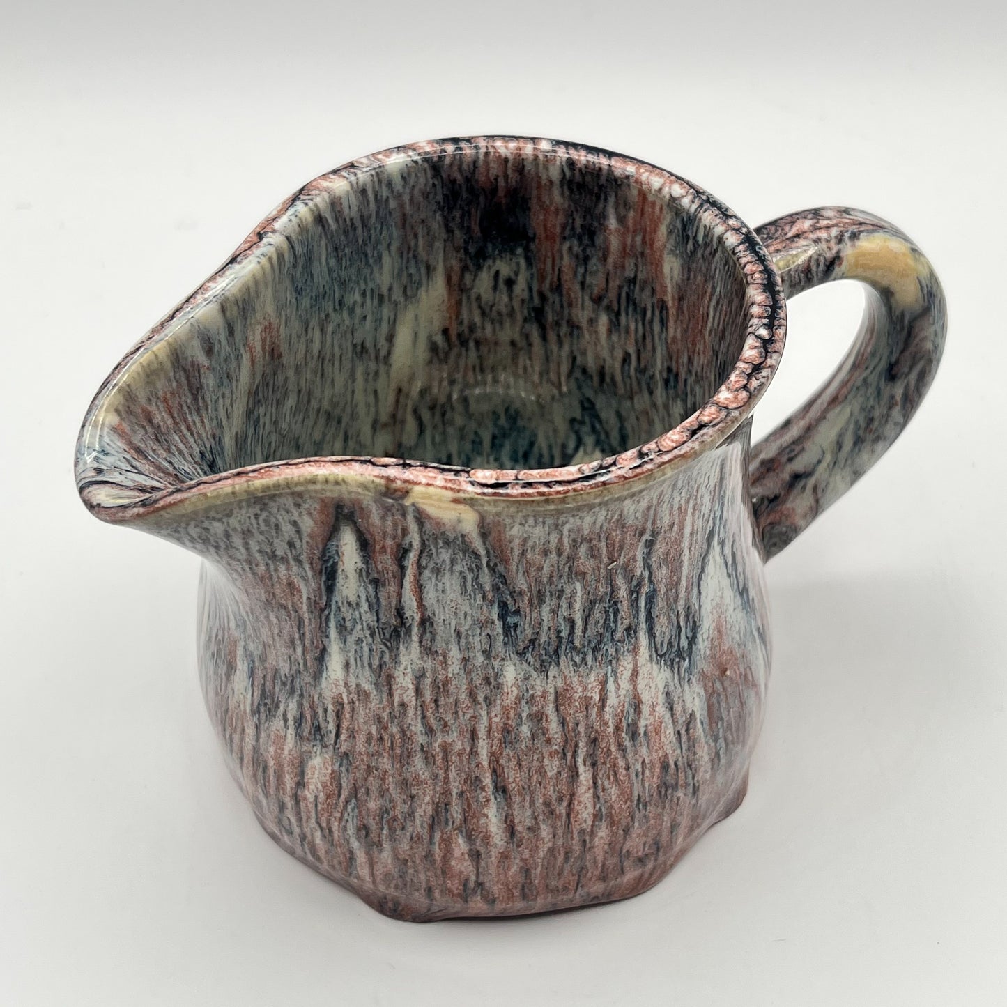 Running Leopard Creamer