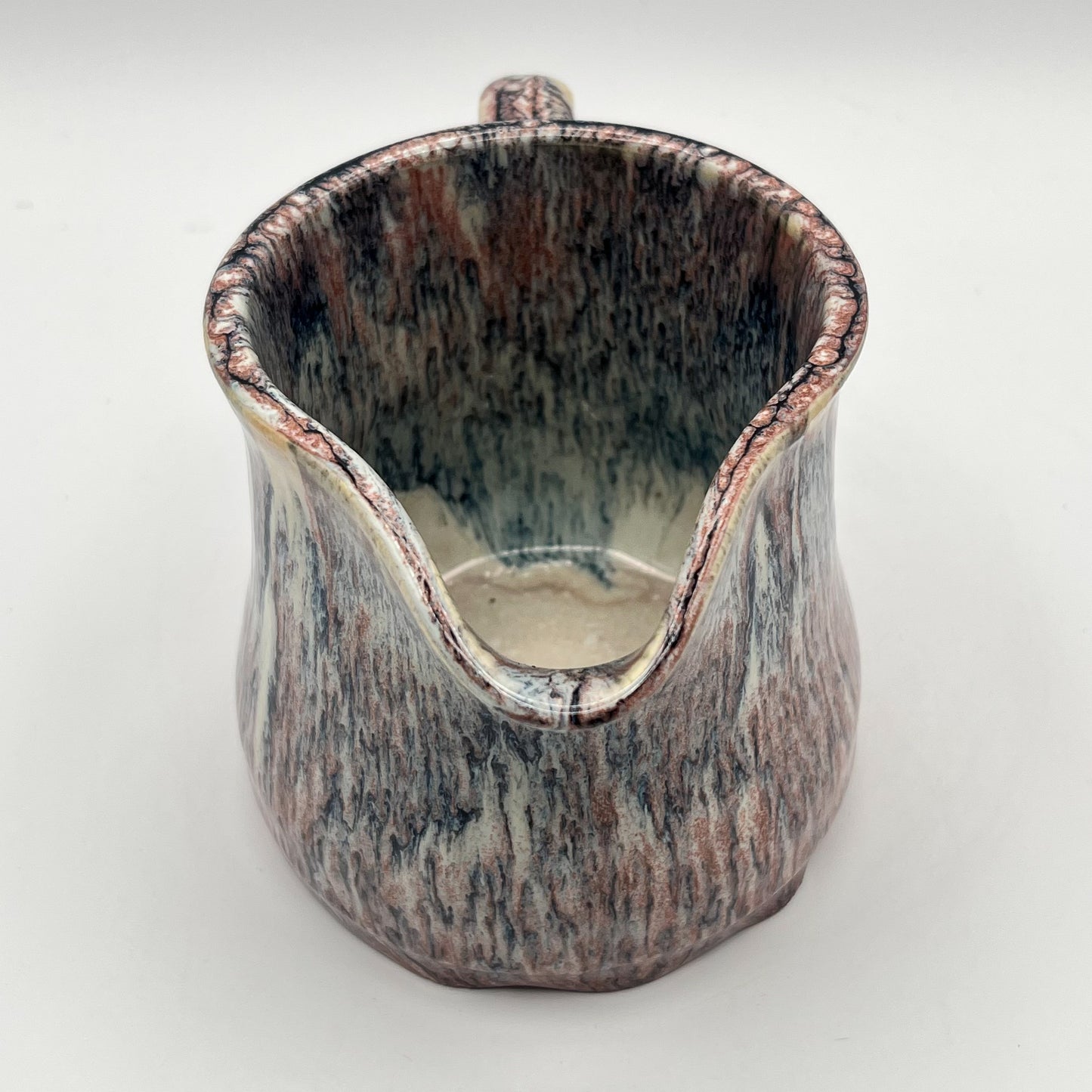 Running Leopard Creamer
