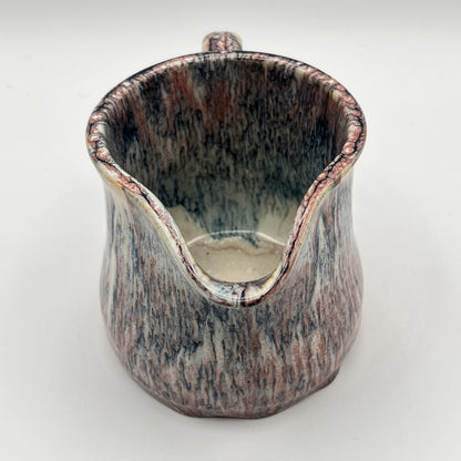 Running Leopard Creamer