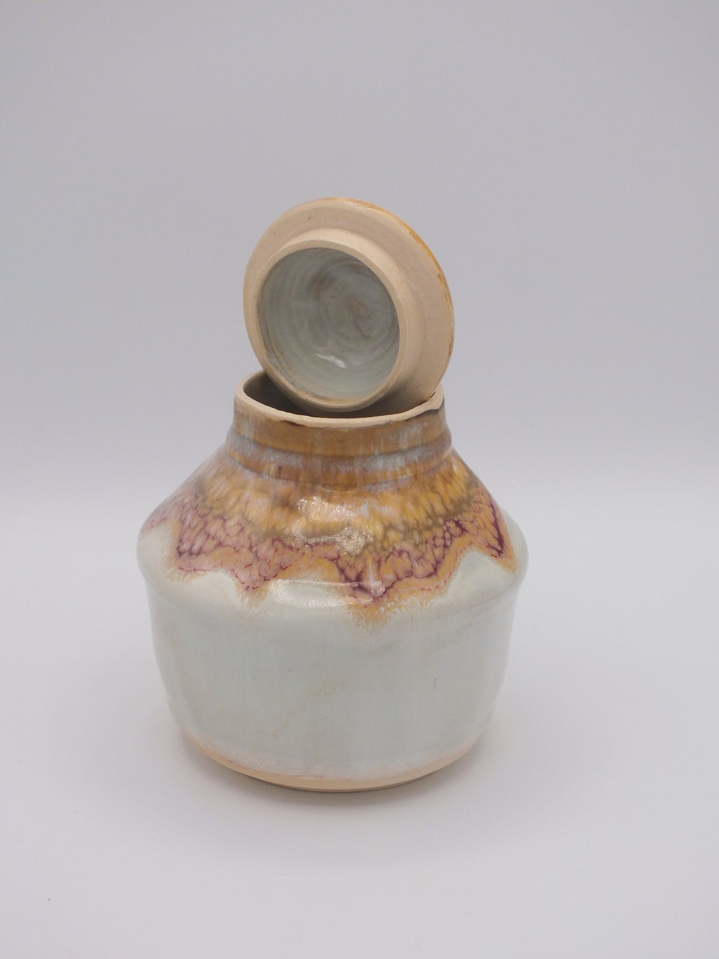 Small stoneware covered jar
