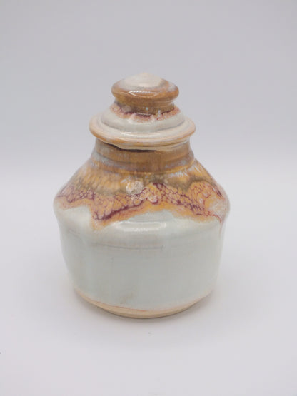 Small stoneware covered jar